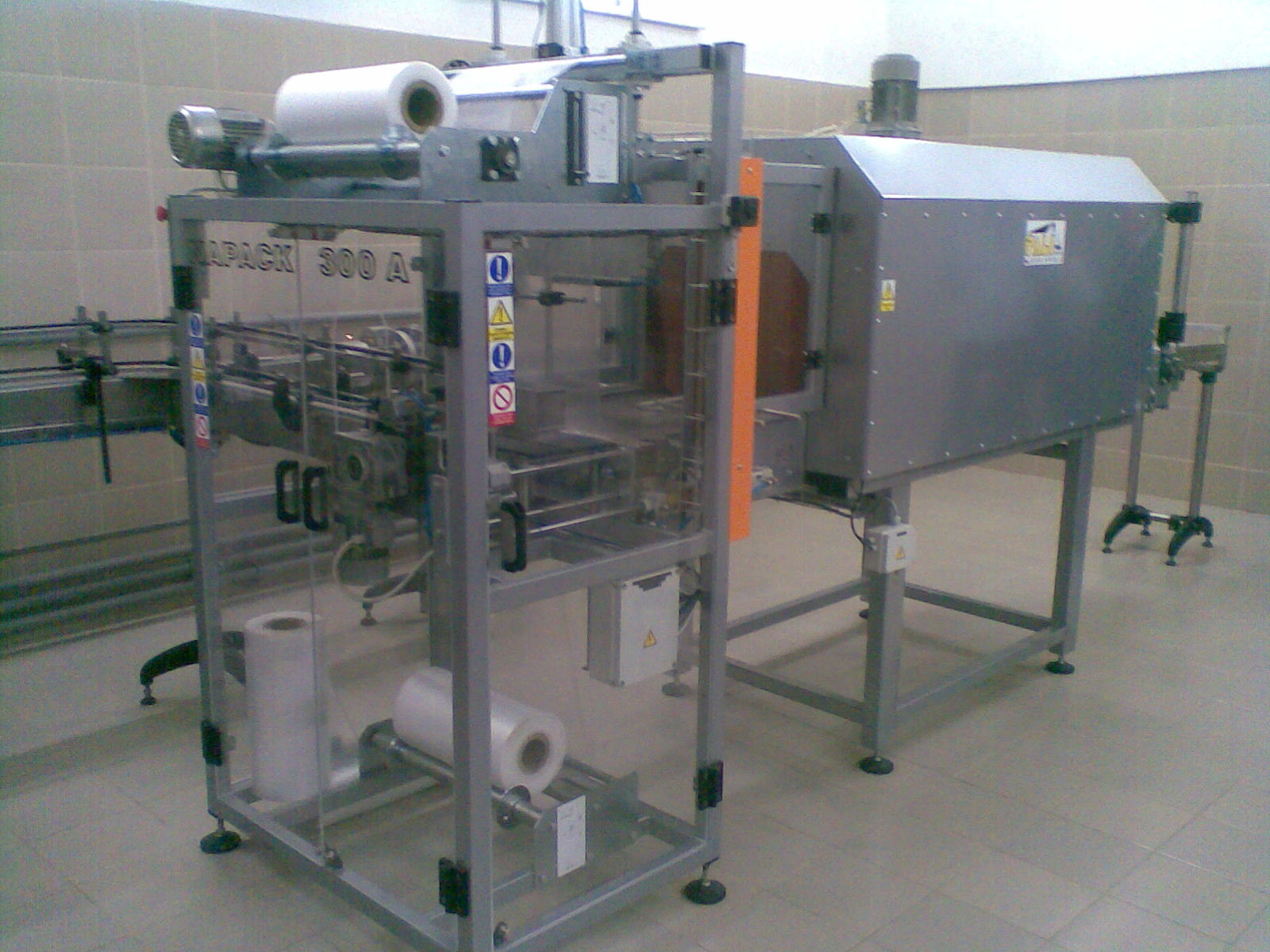Автомат для упаковки бутылок в термоусадочную плёнку  тип NAPACK 300 А ,300пакетов/час