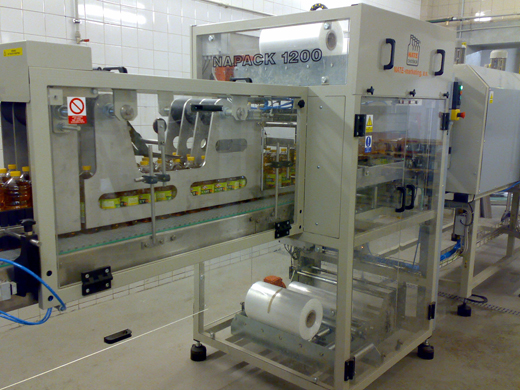 Автоматы и полуавтоматы для упаковки ПЭТ и стеклянных бутылок в термоусадочную плёнку  тип NAPACK